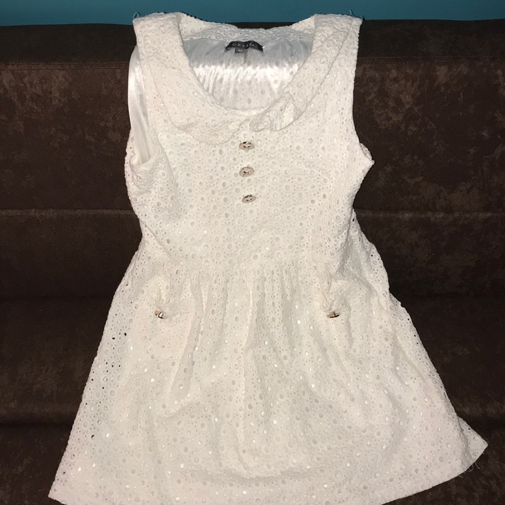 A mid-length white dress